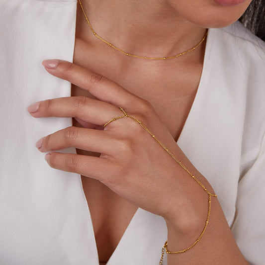 Gold Tone Satellite Hand Chain Bracelet