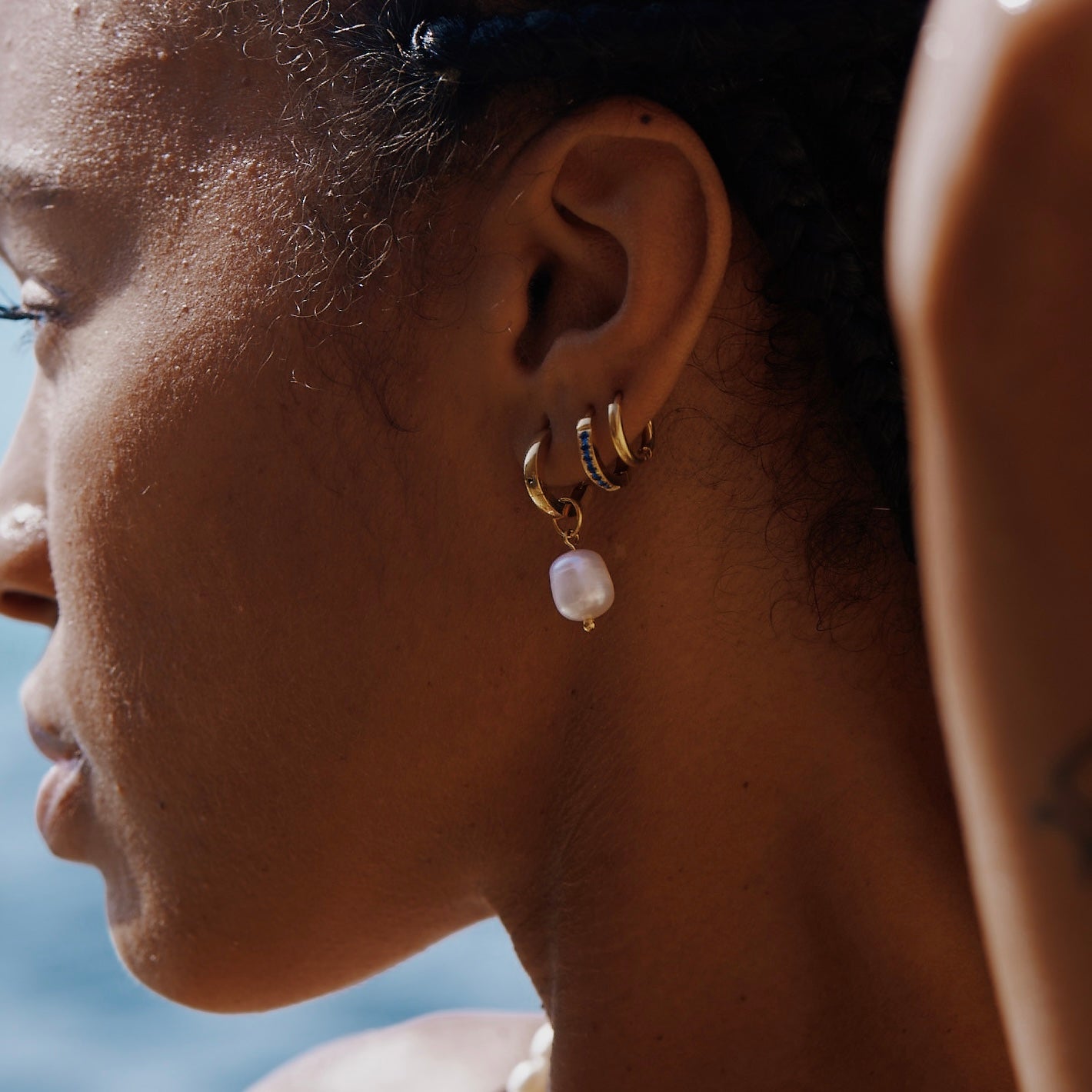 Essential Gold Tone Huggie Hoop Earrings with Pearl Charms