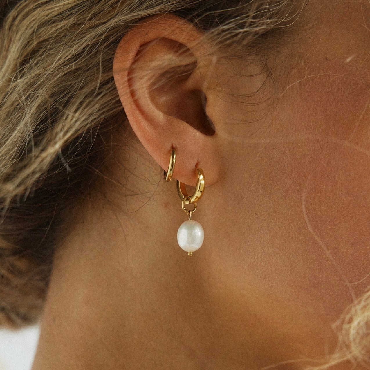Essential Gold Tone Huggie Hoop Earrings with Pearl Charms
