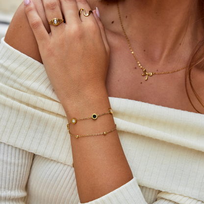 Onyx & Pearl Double Strand Gold Tone Charm Bracelet
