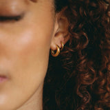 Polished Gold Tone Tapered Dome Hoop Earrings